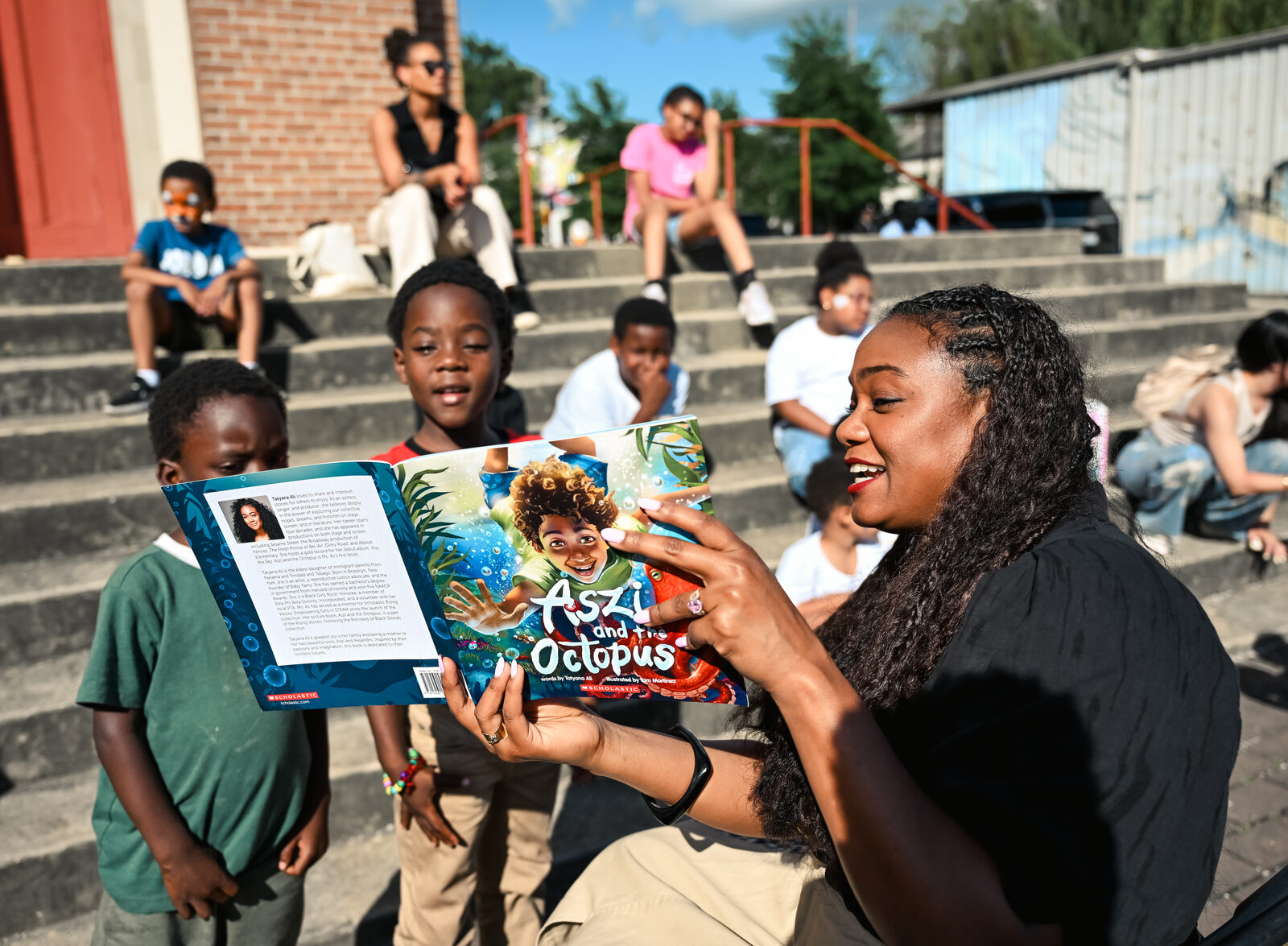 Story time at the Rooted in Love Block Party